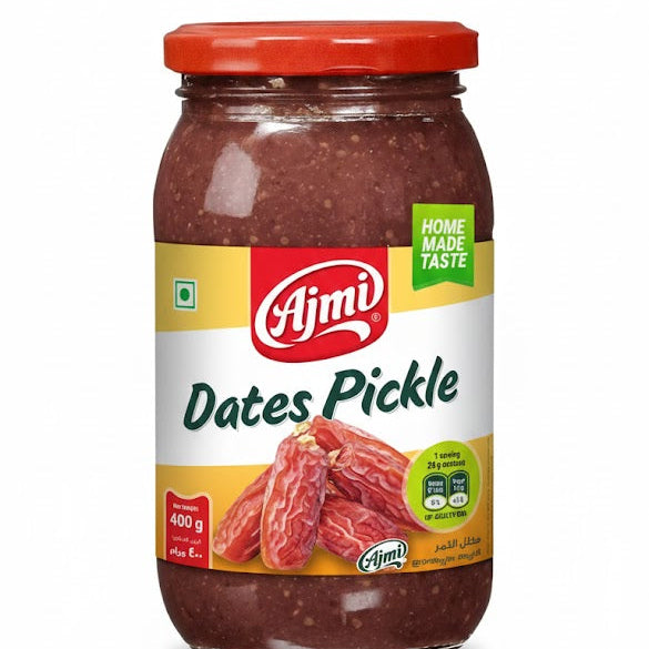 Ajmi Dates Pickle 400g glass jar, featuring a "HOME MADE TASTE" and displaying several whole dates, is available from theindianshelf.co.uk.