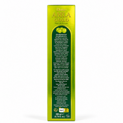 A professional studio shot showcasing the narrow back panel of the rectangular cardboard outer carton for Dabur Amla Gold Hair Oil The design mirrors the side panels with a reflective, metallic golden-green frame outlining a long, dark green arched central column.This product is available in the UK at theindianshelf.co.uk.