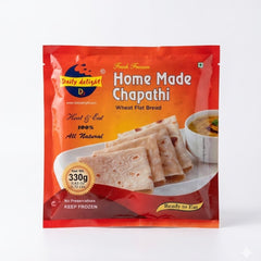 A vibrant orange and red 330g pack of Daily Delight Home Made Chapathi. This wheat flatbread is "100% All Natural" with no preservatives and is sold frozen as a "Heat & Eat" convenience item. The packaging features a serving suggestion of folded chapathis alongside a bowl of curry.
This product is available for purchase in the UK at theindianshelf.co.uk.