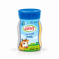 A 200ml white and blue jar of GRB Ghee featuring brand logos, a cow illustration, and an aroma-retention pack design, centered on a solid white background. Available in the UK at theindianshelf.co.uk.
