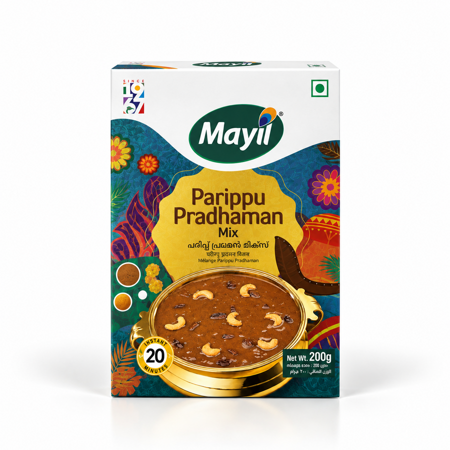 A 200g box of Mayil Parippu Pradhaman Mix featuring colorful traditional artwork and a golden bowl of lentil pradhaman garnished with cashews. Available in the UK at theindianshelf.co.uk.
