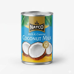 A can of Natco Rich & Creamy Coconut Milk, featuring premium quality coconut extract perfect for adding a smooth, velvety texture to curries, desserts, and soups, is available for purchase at theindianshelf.co.uk.