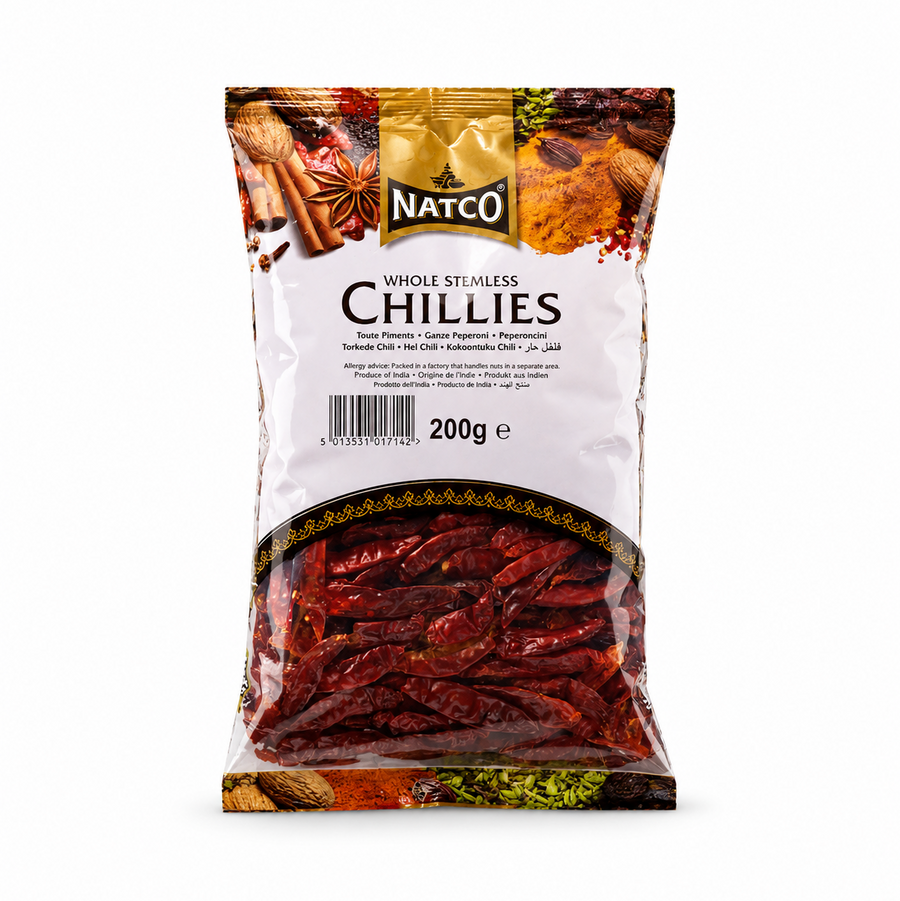 A 200g clear pouch of Natco Whole Stemless Red Chillies showing whole dried red peppers through a window, displayed centered on a solid white background. Available in the UK at indianshelf.co.uk.