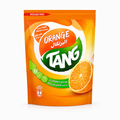 A resealable pouch of Orange Tang instant drink powder centered on a white background, featuring a vibrant orange label with a large green leaf graphic and a fresh sliced orange illustration. This product is available in the UK at theindianshelf.