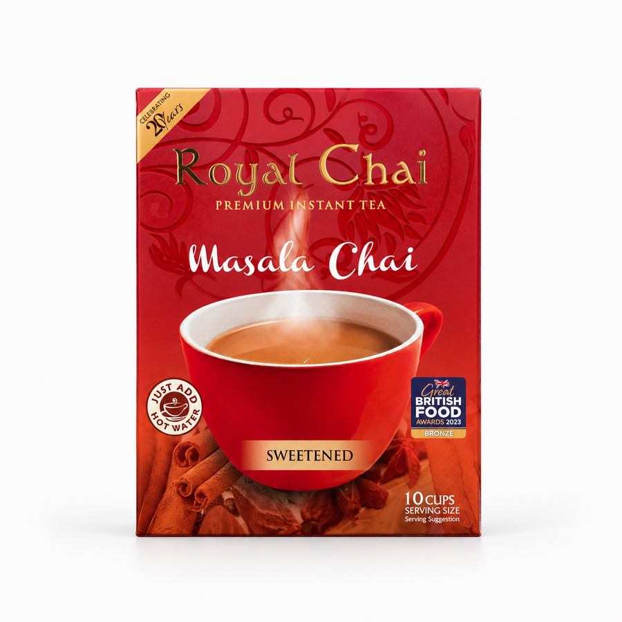 A close-up shot of the back of a red Royal Chai Spiced Masala Chai box showing the "Easy 3 Step Chai" preparation graphics and a descriptive text paragraph titled "How it all began:". This product is available in the UK at theindianshelf.co.uk.