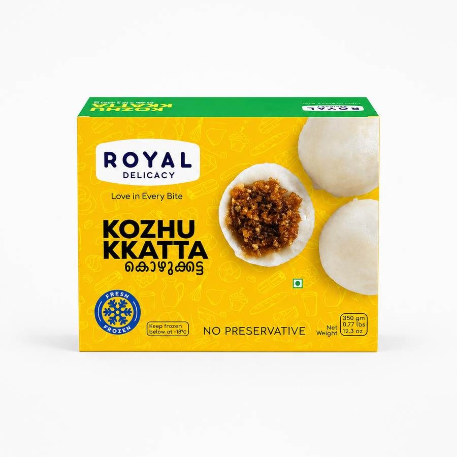 A professional studio shot of the Royal Delicacy Kozhukkatta box. The packaging has a bright yellow background decorated with subtle line drawings of kitchen tools and food items. On the right side, three white, round rice dumplings are shown, with one sliced open to reveal a dark, rich filling of coconut and jaggery. The box features the "Royal Delicacy" logo and prominent labels for "Fresh Frozen,No Preservative and the green vegetarian symbol. This product is available in the UK at theindianshelf.co.uk