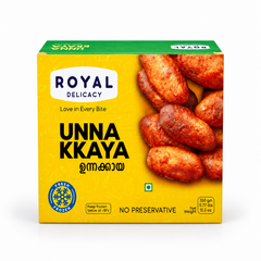 A 350g yellow retail box of Royal Delicacy Unnakaya featuring serving imagery and branding, centered on a solid white background. Available in the UK at theindianshelf.co.uk.