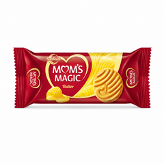 A professional studio product shot of a horizontal rectangular wrapper of Sunfeast Mom's Magic Butter Biscuits against a solid white background. The pack features a rich, glossy crimson-red background. In the center, a large golden heart graphic frames the white and red product name "MOM'S MAGIC" with a small heart icon inside the letter "O", sitting directly above the text "Butter".This product is available in the UK at theindianshelf.co.uk.