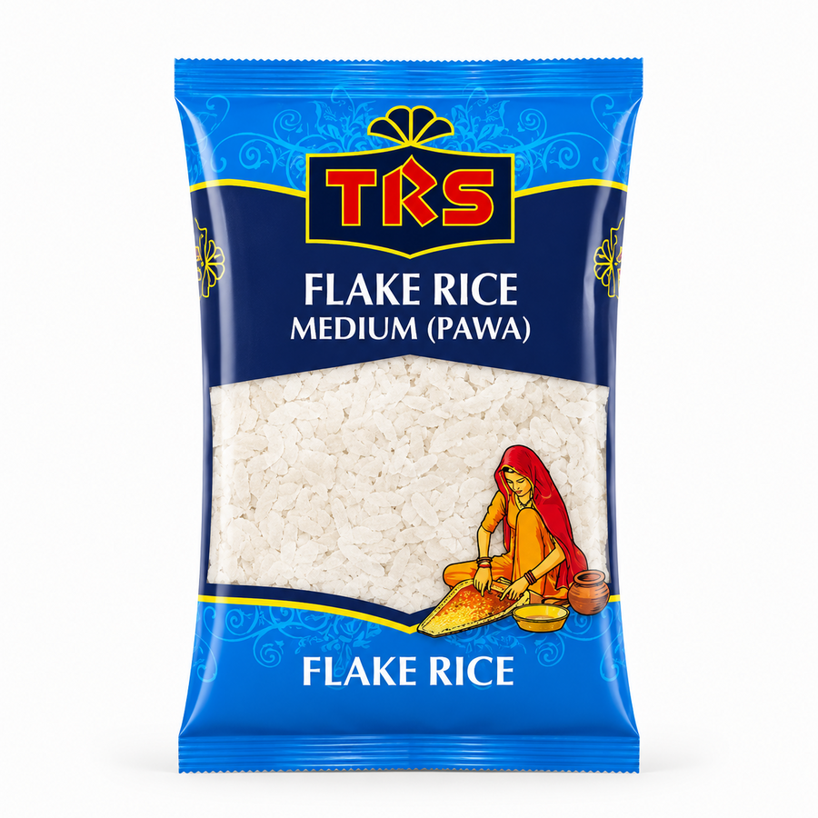 A pouch of TRS Flake Rice Medium (Pawa) centered on a solid white background, featuring a blue and dark navy packaging design with the TRS logo and a clear window displaying white flattened rice flakes next to an illustration of a traditional Indian woman. This product is available in the UK at theindianshelf.co.uk.