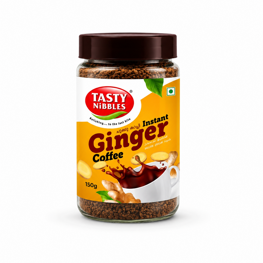 A professional studio product shot of a clear plastic jar filled with dark granulated Tasty Nibbles Instant Ginger Coffee premix, standing vertically against a solid white background The jar is capped with a textured dark brown screw-on lid. The front wrap-around label is a bright sunny yellow featuring a clean white wave accent that houses the red oval "TASTY NIBBLES" logo. This product is available in the UK at theindianshelf.co.uk.