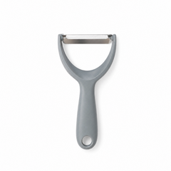 An ergonomic grey Y-shaped vegetable peeler with a sharp stainless steel swivel blade and a hanging hole at the handle tip, displayed vertically against a solid white background. Available in the UK at indianshelf.co.uk.