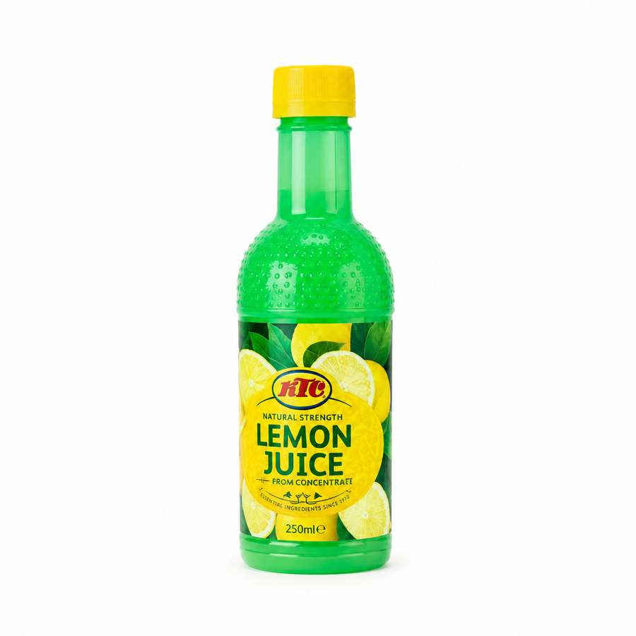 A 250ml green bottle of KTC Lemon Juice from Concentrate centered on a solid white background, featuring a yellow cap and a label illustrated with fresh lemons and green leaves. This product is available in the UK at theindianshelf.co.uk.