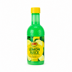 A 250ml green bottle of KTC Lemon Juice from Concentrate centered on a solid white background, featuring a yellow cap and a label illustrated with fresh lemons and green leaves. This product is available in the UK at theindianshelf.co.uk.