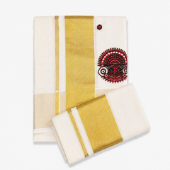 A neatly folded off-white Kerala tissue cotton single set mundu with its matching neryathum folded diagonally on top against a solid white background, featuring a wide metallic gold zari border and a vibrant red and black Theyyam ritual art motif. Available in the UK at theindianshelf.co.uk.