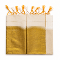 An unfolded traditional Kerala tissue saree centered on a solid white background, displaying the full golden kasavu pallu (mundani) with rich textured zari weaving, elegant striped accents, and handcrafted yellow and white tassels at the border.