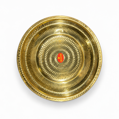 A 13-inch brass thambulam plate featuring a detailed dot-press textured pattern and a polished golden finish, centered on a solid white background. Available in the UK at theindianshelf.co.uk.
