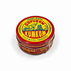 A round red and yellow tin of Gopuram Kumkum featuring traditional branding, centered on a solid white background. Available in the UK at theindianshelf.co.uk.