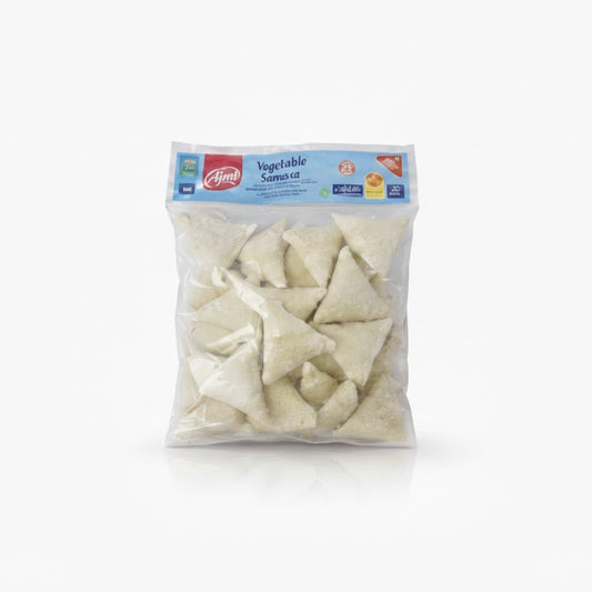 Ajmi Fresh Frozen Vegetable Samosa 1kg pack, featuring authentic crispy pastry triangles with a savory vegetable filling, is available for purchase at theindianshelf.co.uk.
