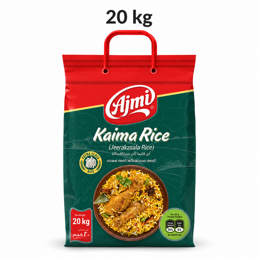 A professional studio shot of a 20 kg bag of Ajmi Kaima Rice. The packaging features a striking red top section with a built-in red handle and a deep forest green lower section adorned with a subtle landscape line drawing. The white "Ajmi" logo is set in a red oval, with "Kaima Rice" and "(Jeerakasala Rice)" printed prominently in white. A central circular image displays a vibrant chicken biryani garnished with fresh cilantro and whole spices. This product is available in the UK at theindianshelf.co.uk.