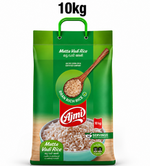 A professional studio product shot of a 10kg green rectangular rice sack with a built-in green plastic carrying handle, standing vertically against a solid white background under a bold "10kg" floating text label. The front face of the packaging features a multi-shaded green design. At the top, the product name "Matta Vadi Rice" is written in elegant script along with its Malayalam translation. This product is available in the UK at theindianshelf.co.uk.