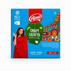 5.5kg square blue box of Ajmi Onam Sadhya centered on a white background, featuring a woman in a red saree next to a green banana leaf design and colorful Kathakali artwork. This product is available in the UK at theindianshelf.co.uk.
