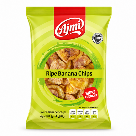 A professional studio shot of the Ajmi Ripe Banana Chips packaging as shown in image_e1e130.jpg. The bag is a vibrant lime green with darker green concentric circles. The red "Ajmi" logo sits at the top center, and a central circular window reveals the deep golden-brown, caramelized ripe banana chips inside. A . The bottom of the bag includes a "GMP Certified" badge and a nutritional table showing 170 Kcal energy, 0 mg cholesterol, and 11 g sugar.This product is available in the UK at theindianshelf.co.uk.