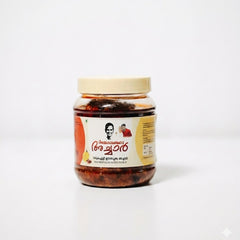 Ammayimarude Vadukapuli & Dates Pickle
Indulge in a unique fusion of flavors with Ammayimarude Vadukapuli & Dates Pickle. This specialty pickle combines the bold, citrusy tang of Vadukapuli Naranga (Wild Lemon) with the natural, jammy sweetness of dates, creating a perfectly balanced sweet-and-sour profile.Available in the UK at theindianshelf.co.uk.