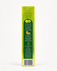 A professional studio shot showcasing the narrow side panel of the rectangular cardboard box for Dabur Amla Gold Hair Oil The box features a reflective, metallic golden-green background framing a long, dark green central panel with an arched top.This product is available in the UK at theindianshelf.co.uk.