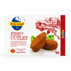 A professional studio shot of a landscape-oriented rectangular white box for Daily Delight Fish Cutlet against a solid white background. The left side features the colorful "Daily Delight" logo above the bold red text "FISH CUTLET" and a short product description. The center showcases two golden-brown, breaded, oval-shaped fried fish cutlets garnished with fresh green coriander leaves. This product is available in the UK at theindianshelf.co.uk.