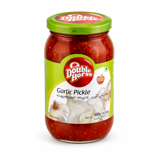 A professional studio shot of a 400g jar of Double Horse Garlic Pickle. The glass jar is filled with whole garlic cloves immersed in a rich, red-colored spiced oil base. The label is bright green and white, featuring the prominent red and white "Double Horse" logo. The words "Garlic Pickle" are clearly printed in black An illustration of fresh white garlic bulbs is visible at the bottom of the label. This product is available in the UK at theindianshelf.co.uk.