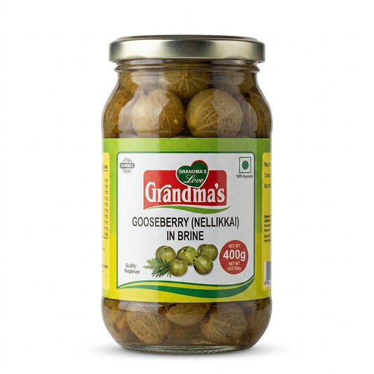 Grandma's Gooseberry in Brine (Nellikkai)
Experience the pure, tart flavor of South India with Grandma's Gooseberry in Brine. This 400g jar features whole, sun-ripened gooseberries (Nellikka) preserved in a traditional salt-water brine, maintaining their crisp texture and potent nutritional profile.This product is available in the UK at theindianshelf.co.uk.