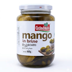 Grandma's Mango in Brine (Uppumanga)
Savor the simple, traditional taste of Kerala with Grandma's Mango in Brine. This 400g jar contains tender, whole baby mangoes preserved in a salted brine solution, a classic preparation known as Uppumanga that captures the essence of rural South Indian kitchens.This product is available in the UK at theindianshelf.co.uk.