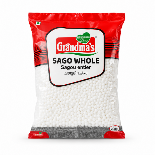 A studio product shot of a pillow pouch of Grandma's Premium Sago Whole isolated against a clean white background. The packaging features a vibrant red and white label displaying the brand logo above a clear window filled with small, uniform white sago pearls