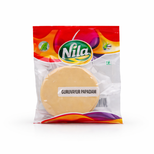 This is a pack of Guruvayur Pappadam from the brand Nila. These traditional, thin, and crispy South Indian wafers are often served as an accompaniment to meals or as a snack.
This product is available in the UK at theindianshelf.co.uk.