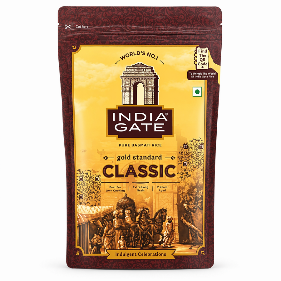 A professional studio shot of an India Gate Classic Basmati Rice resealable pouch. The packaging features a premium gold and deep maroon color palette. The center displays the iconic "India Gate" logo under an illustration of the India Gate monument. Below, "gold standard CLASSIC" is written in bold, elegant typography. The bottom of the bag features a traditional heritage illustration of a royal chariot and figuresThis product is available in the UK at theindianshelf.co.uk.