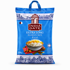 A professional studio shot of a 20kg bright blue woven fabric bag of India Gate Extra Long Basmati Rice Excel featuring a dark blue top carrying handle against a solid white background. The top and bottom base borders display detailed, dark blue sketch illustrations of traditional Indian rural village life, historical landmarks, and camel caravans. The center layout features the iconic white-and-brown "INDIA GATE" This product is available in the UK at theindianshelf.co.uk.