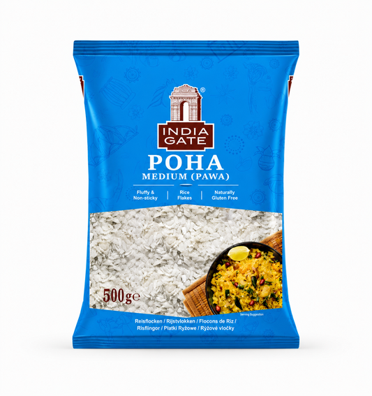 A studio product shot of a bright blue pillow pouch bag of India Gate Poha Medium (Pawa) against a solid white background. The top center displays the classic white-and-brown "INDIA GATE" monument logo, directly above the product title "POHA MEDIUM (PAWA)" in bold white lettering. A large, transparent window across the center clearly showcases the white flattened rice flakes inside. In the bottom right corner, This product is available in the UK at theindianshelf.co.uk.