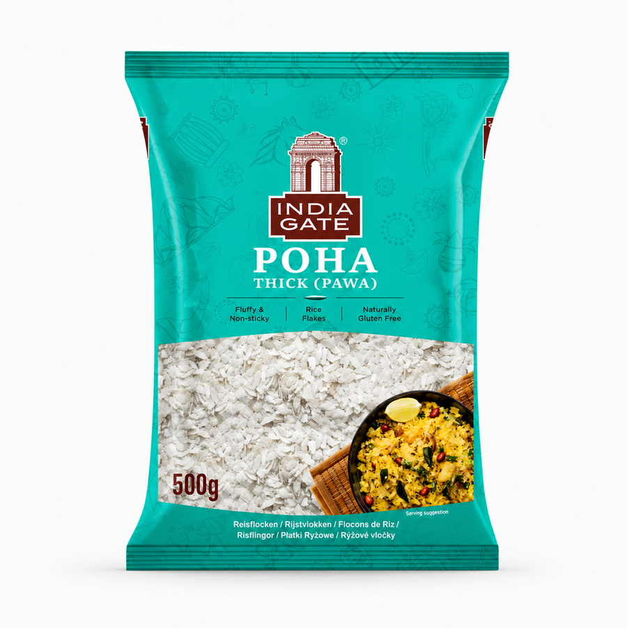 A studio product shot of a turquoise-green pillow pouch bag of India Gate Poha Thick (Pawa) against a solid white background. The top center displays the iconic white-and-brown "INDIA GATE" monument logo, directly above the product title "POHA THICK (PAWA)" in bold white lettering. A large, transparent window across the center clearly showcases the raw white flattened rice flakes inside. In the bottom right corner, This product is available in the UK at theindianshelf.co.uk.