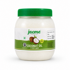 A professional studio shot of a 500 mL translucent wide-mouth plastic jar of Jacme Coconut Oil. The jar contains solidified white coconut oil and is sealed with a prominent green ribbed screw-on lid. The central white label features the green "jacme" logo with its tagline "natural as it is" against a faint palm frond pattern background. Below the logo a graphic showcases a whole brown coconut next to a split open coconut half with fresh white flesh.This product is available in the UK at theindianshelf.co.uk
