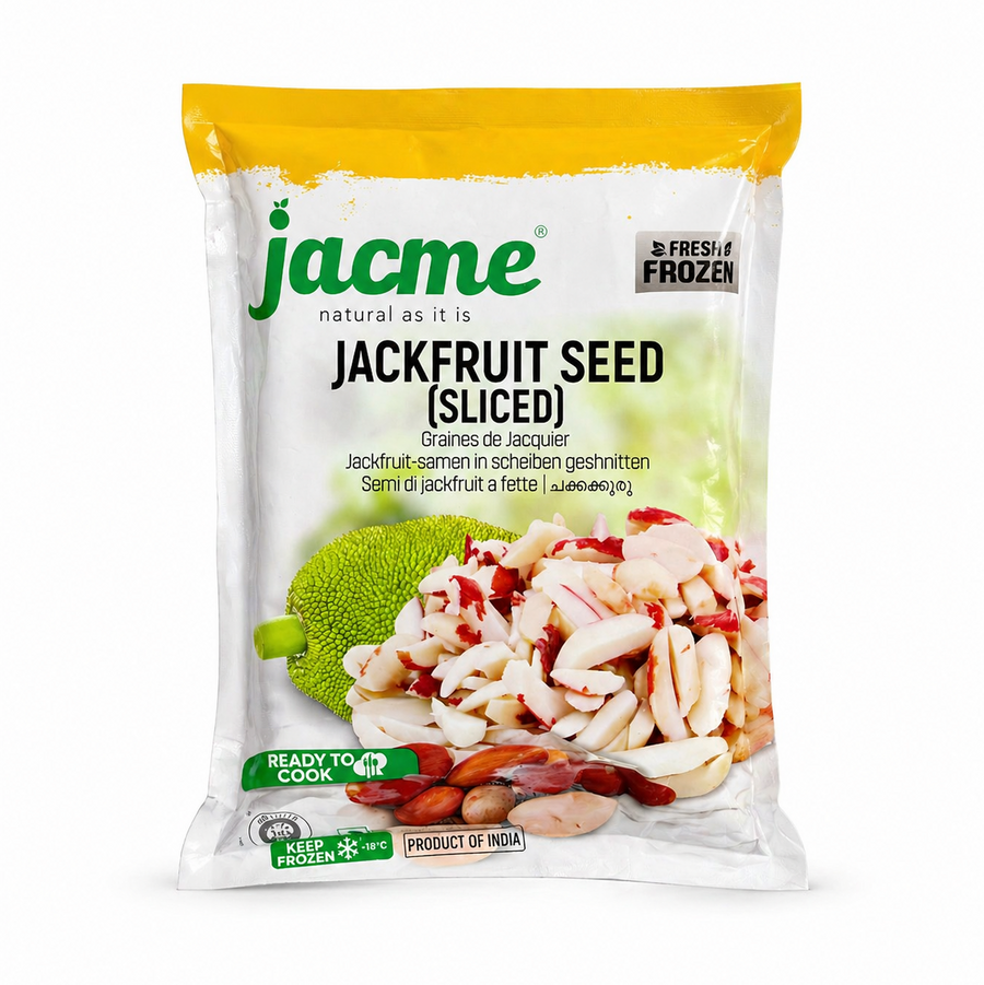 A professional studio shot of the Jacme Jackfruit Seed (Sliced) packaging. The white and yellow bag features the green "Jacme" logo and a "Fresh & Frozen" seal at the top. A large central image shows a pile of pale, sliced jackfruit seeds with reddish skins, positioned next to a whole green jackfruit.This product is available in the UK at theindianshelf.co.uk.