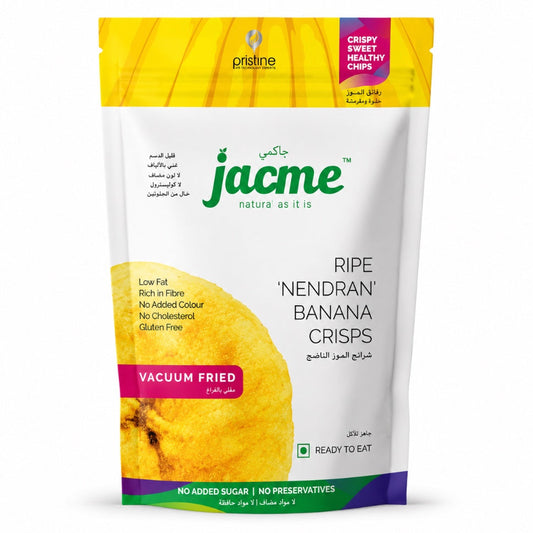 A professional studio shot of the Jacme Ripe 'Nendran' Banana Crisps stand-up pouch The packaging is predominantly white with a vibrant yellow top section and a purple base. A large, high-detail image of a golden-yellow vacuum-fried banana slice is featured on the left side. The green "jacme" logo and product name are centered. Key benefits like "Low Fat," "Rich in Fibre," and "Vacuum Fried" are listed in both English and Arabic. This product is available in the UK at theindianshelf.co.uk.