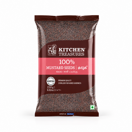 A 250g pouch of Kitchen Treasures 100% Mustard Seeds centered on a white background, featuring a dark brown label design with a pink horizontal band displaying the whole seeds through transparent windows. This product is available in the UK at theindianshelf.co.uk.