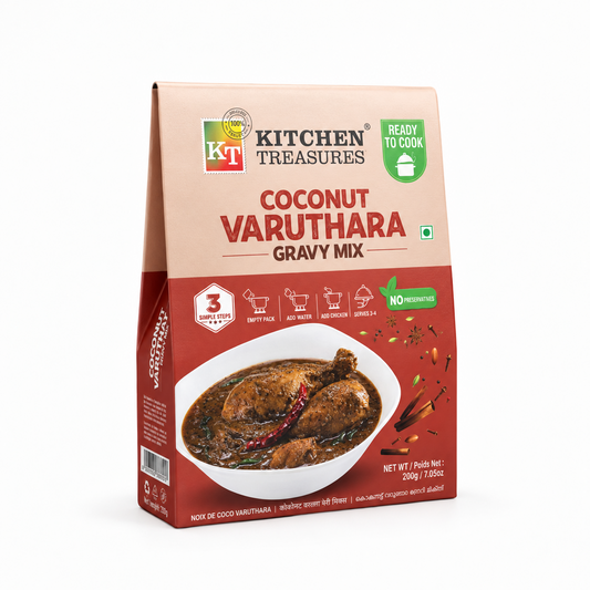  A 200g box of Kitchen Treasures Coconut Varuthara Gravy Mix showing a bowl of rich roasted coconut chicken curry on a solid white background. Available in the UK at theindianshelf.co.uk.
