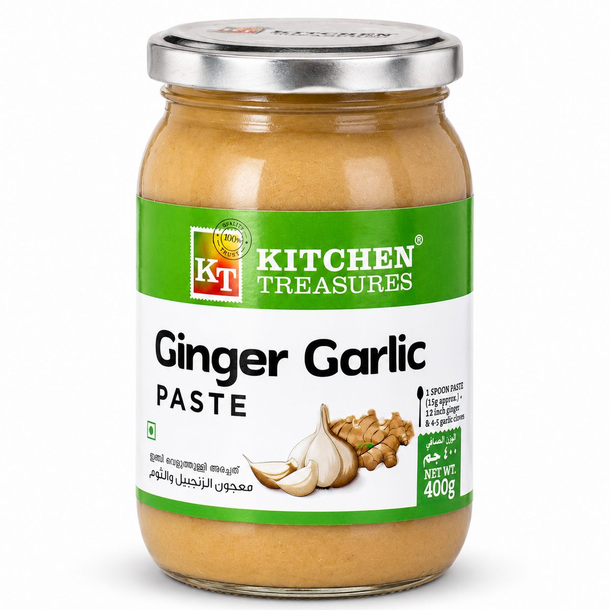 A professional studio shot of a 400g glass jar of Kitchen Treasures Ginger Garlic Paste The label has a prominent green top section with the "KT Kitchen Treasures" logo. The middle of the label shows a high-quality graphic of fresh garlic cloves and ginger root. Key highlights such as "100% Natural Ingredients" and "No Added Preservatives & Colours" are clearly visible.This product is available in the UK at theindianshelf.co.uk.