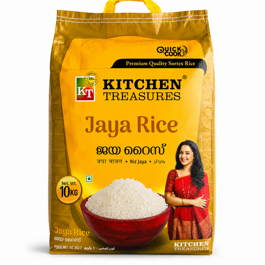 A professional studio shot of a large 10 kg woven sack of Kitchen Treasures Jaya Rice The packaging features a vibrant golden-yellow and metallic bronze color scheme with a built-in yellow carrying handle at the top. The bold "KT Kitchen Treasures" logo is featured near the top center under a black banner that reads "Quick Cook - Premium Quality Sortex Rice." In the center, a large wooden bowl filled with a high mound of raw, white jaya rice grains This product is available in the UK at theindianshelf.co.uk