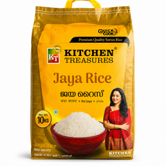 A professional studio shot of a large 10 kg woven sack of Kitchen Treasures Jaya Rice The packaging features a vibrant golden-yellow and metallic bronze color scheme with a built-in yellow carrying handle at the top. The bold "KT Kitchen Treasures" logo is featured near the top center under a black banner that reads "Quick Cook - Premium Quality Sortex Rice." In the center, a large wooden bowl filled with a high mound of raw, white jaya rice grains This product is available in the UK at theindianshelf.co.uk