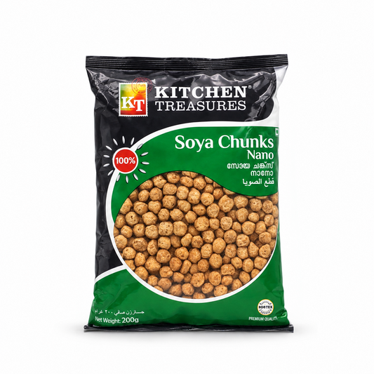 A 200g pack of Kitchen Treasures Soya Chunks Nano featuring miniature soy nuggets on a clean green and black pouch, centered on a solid white background.Available in the UK at theindianshelf.co.uk