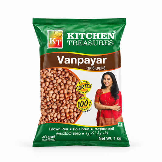 A 1kg pack of Kitchen Treasures Vanpayar red cowpeas in green and white packaging featuring a clear view window showing brown peas, centered on a solid white background. Available in the UK at theindianshelf.co.uk.