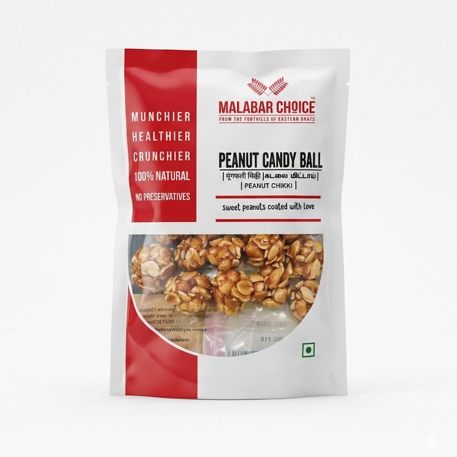 A white and red stand-up pouch of Malabar Choice Peanut Candy Ball (also known as Peanut Chikki). The packaging highlights that the product is "Munchier, Healthier, Crunchier," 100% natural, and contains no preservatives. A transparent window on the front reveals several round, bite-sized balls made of roasted peanuts coated in jaggery.This traditional Indian snack is available for purchase in the UK at theindianshelf.co.uk.