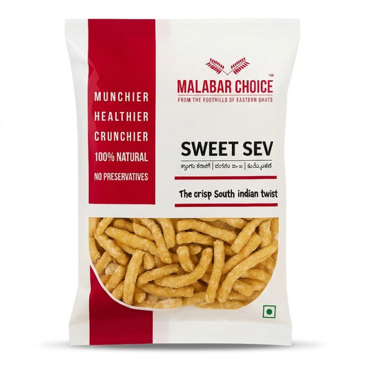 A white and red bag of Malabar Choice Sweet Sev, featuring "The crisp South indian twist," is available for purchase at theindianshelf.co.uk. This 100% natural snack contains no preservatives and is marketed as munchier, healthier, and crunchier.